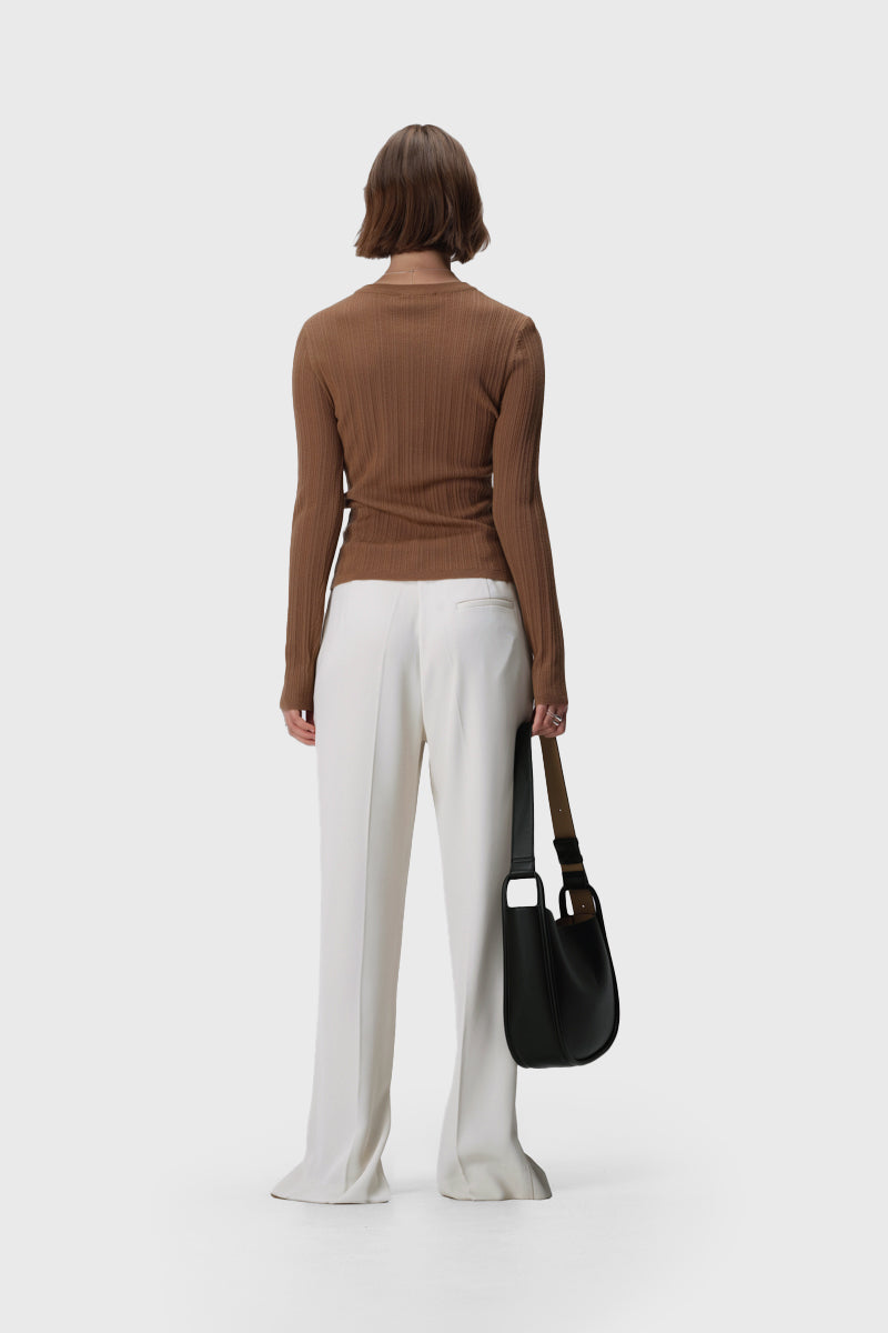 Long sleeve rib knit henley top with crew neckline, button front and slim fit