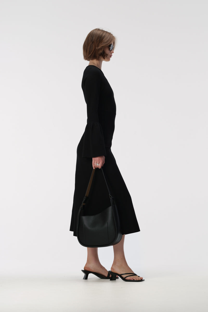Midi length slim fit knit dress with round neckline and full length bell sleeves