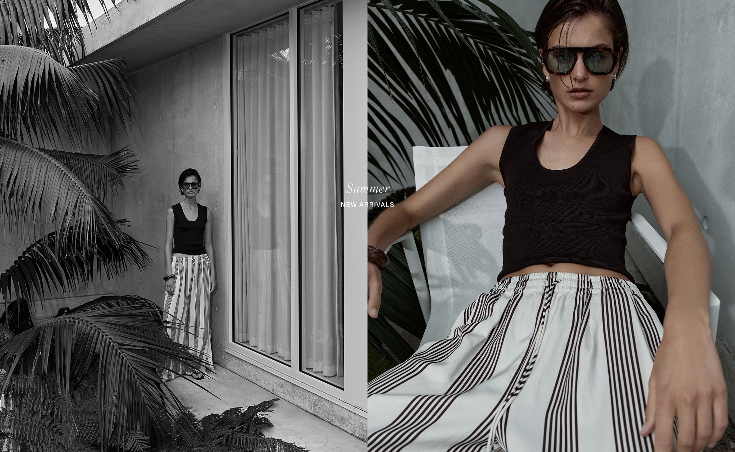 Woman in black top and patterned pants standing in a modern interior with plants.