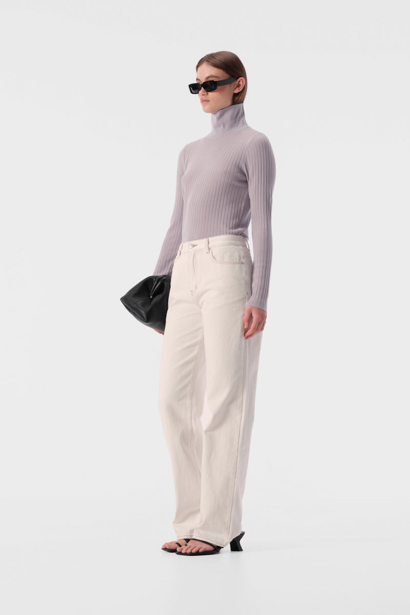 Slim fit turtleneck top with full length sleeves and ribbed texture fabric