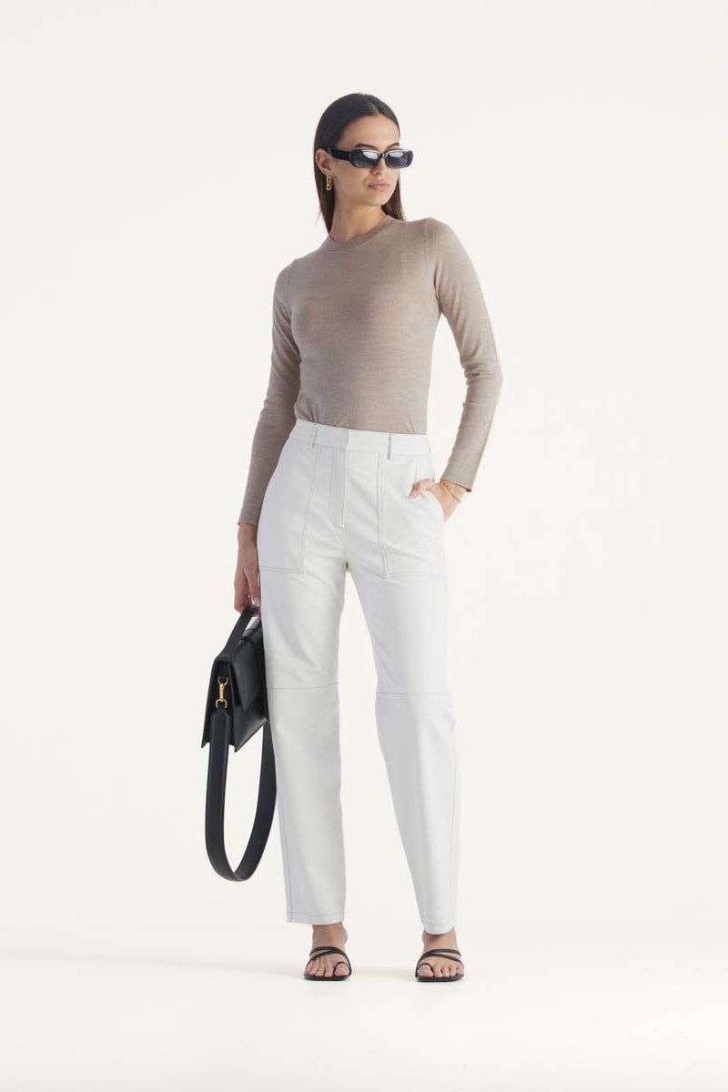 High waisted straight leg vegan leather pant with contrasting seam detail in ivory