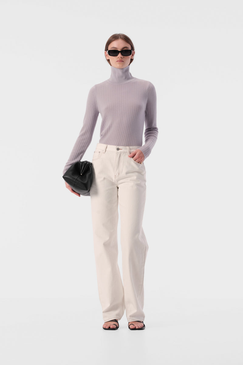 Slim fit turtleneck top with full length sleeves and ribbed texture fabric