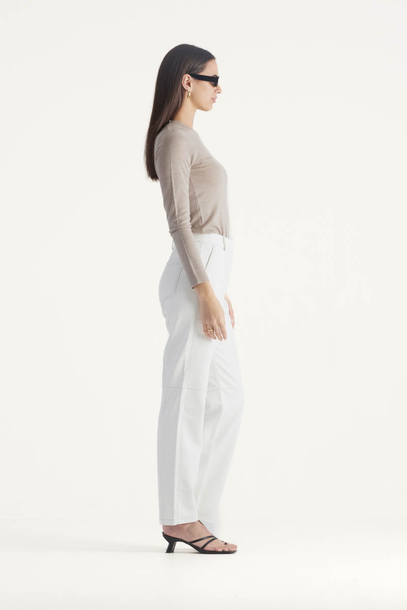 High waisted straight leg vegan leather pant with contrasting seam detail in ivory
