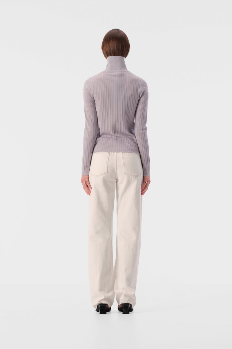 Slim fit turtleneck top with full length sleeves and ribbed texture fabric
