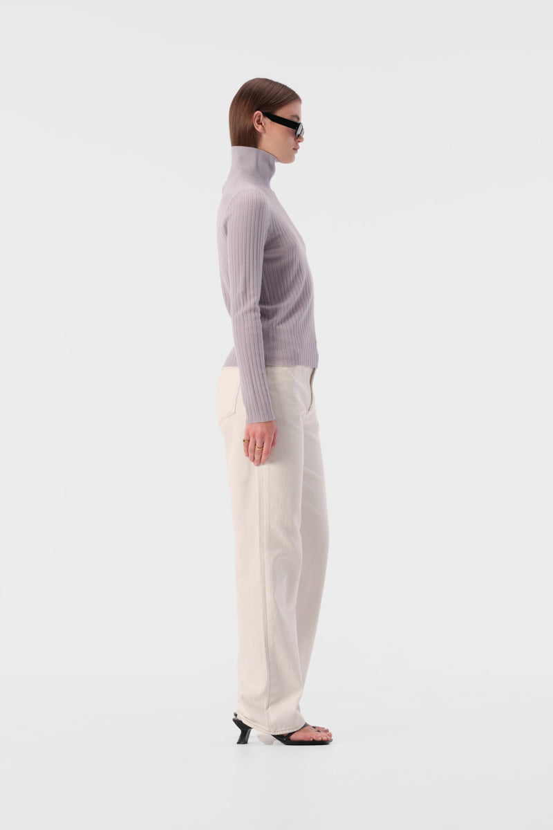 Slim fit turtleneck top with full length sleeves and ribbed texture fabric